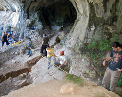 Students working in cave