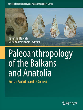 Book cover featuring a hominid skull and lithic technology