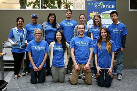 Group photo of students in blue "Let's Talk Science" t-shirts