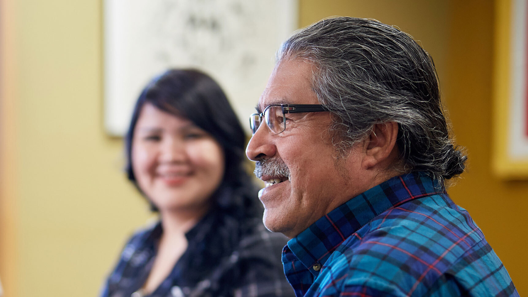 Elder talking with students