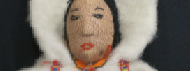 Pixellated image of an Inuit felt doll