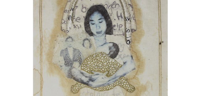 black & white photo of woman holding baby swaddled in fabric covered in golden thread, with cursive text beside her, and semi-obscured smaller black & white photos of the woman's parents standing beside her