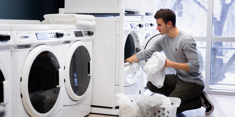 Student doing laundry