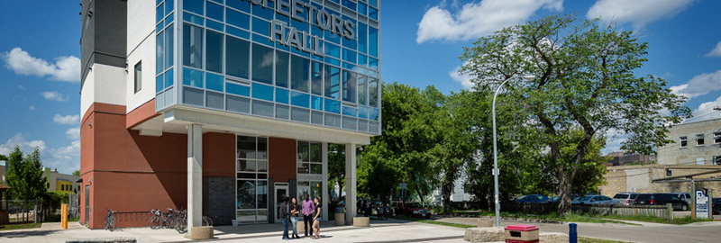 Students standing outside McFeetors Hall