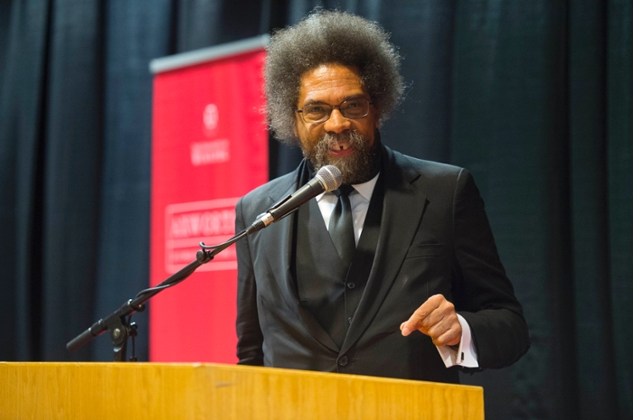 Dr. Cornel West speaking at a podium