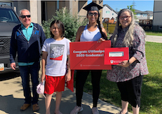 Members of the Aboriginal Student Services Centre with graduate Janelle Jackson