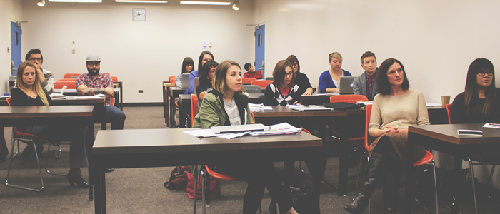 Students and professors sitting in a classroom