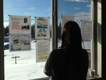 CSRG members peruse exhibit materials (photo credit: Angela Failler)