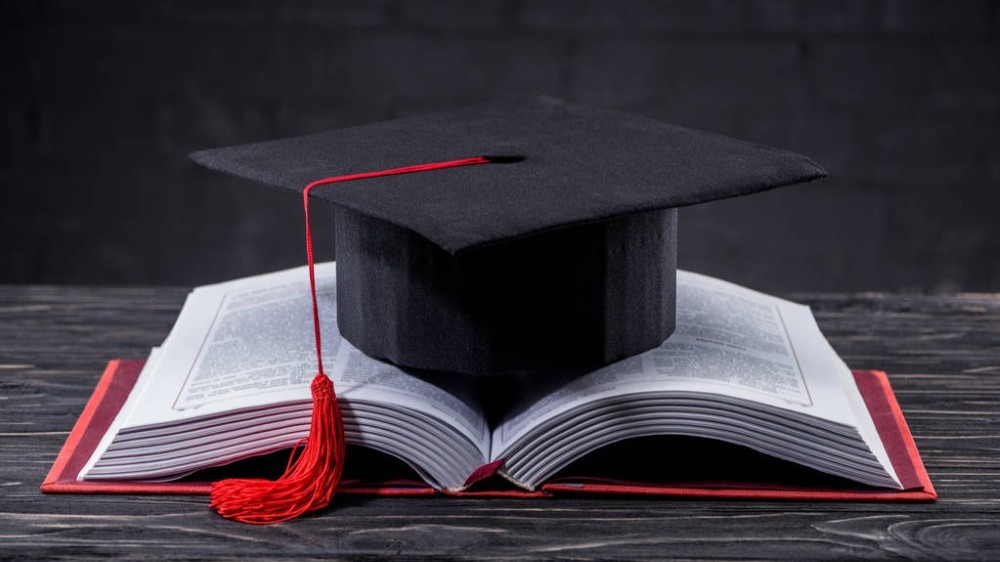 open-book-graduation-cap.jpg