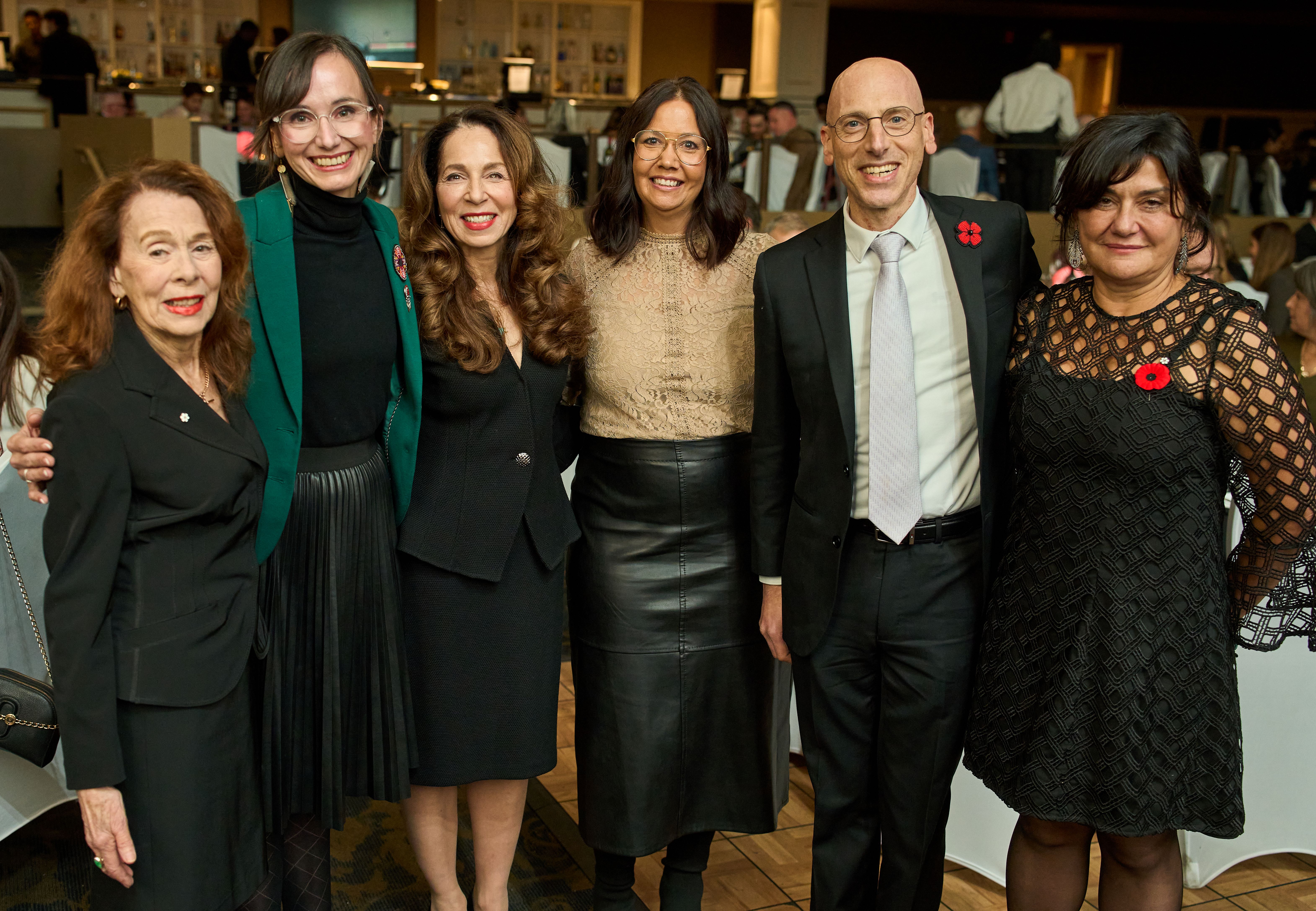 Ida Albo poses with dinner guests