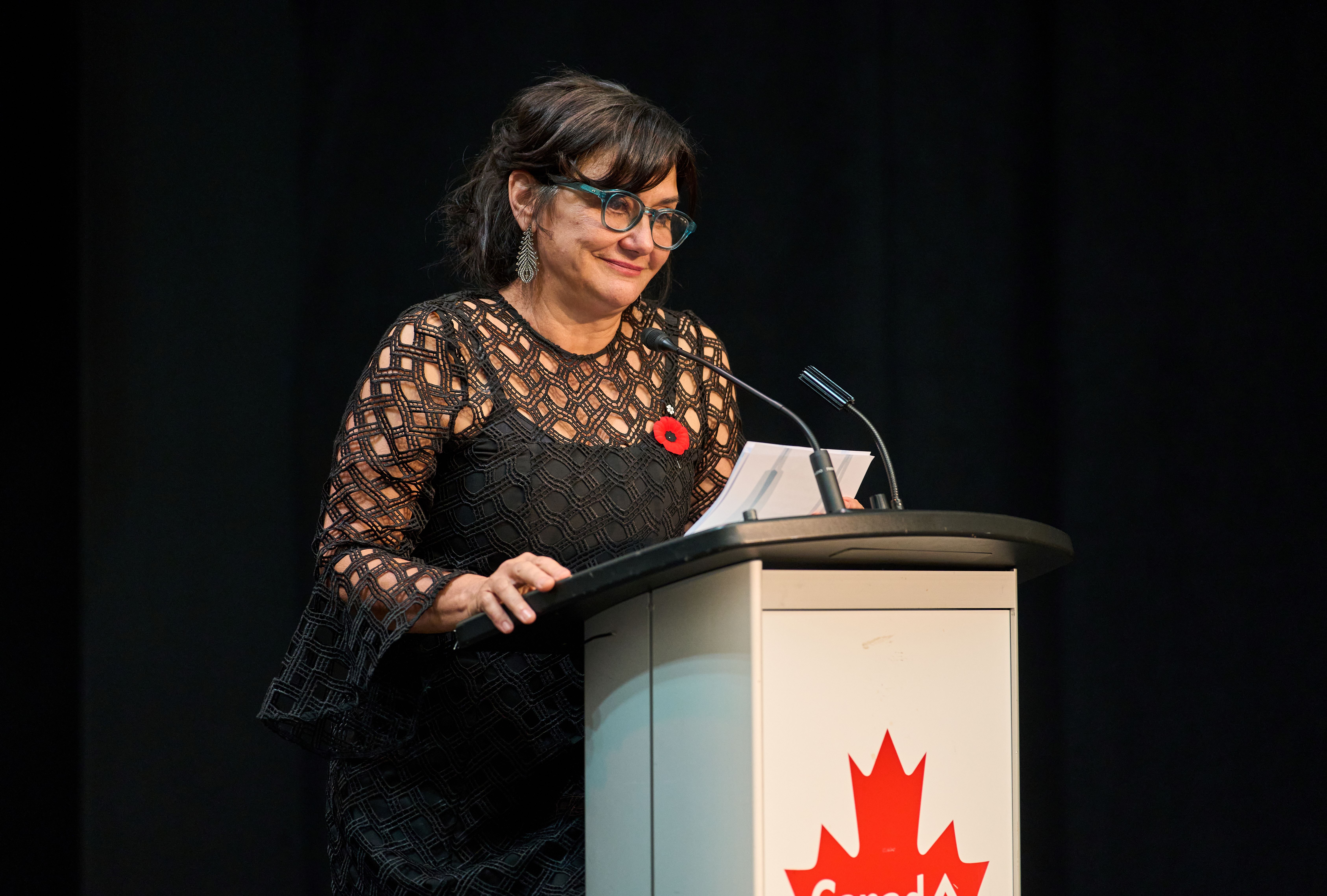 Dr. Albo giving a speech