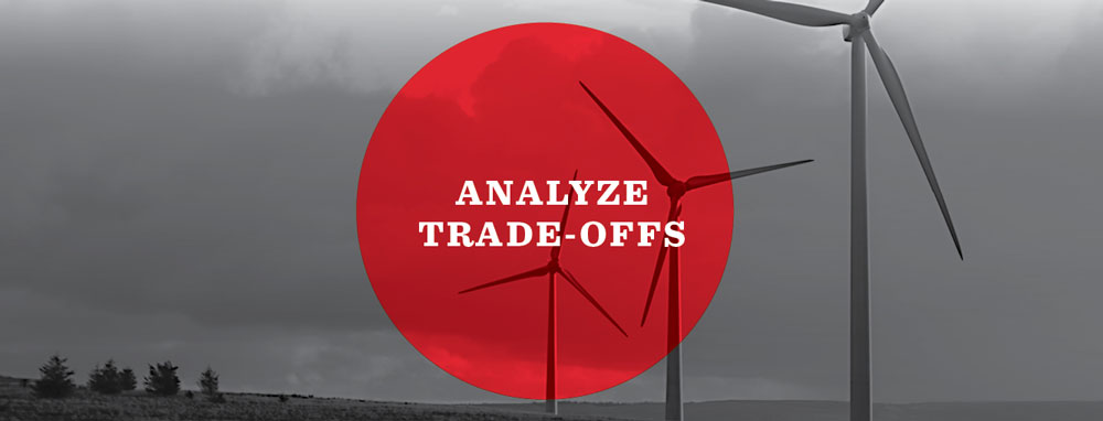 Analyze Trade-Offs text with landscape and wind turbines in the background