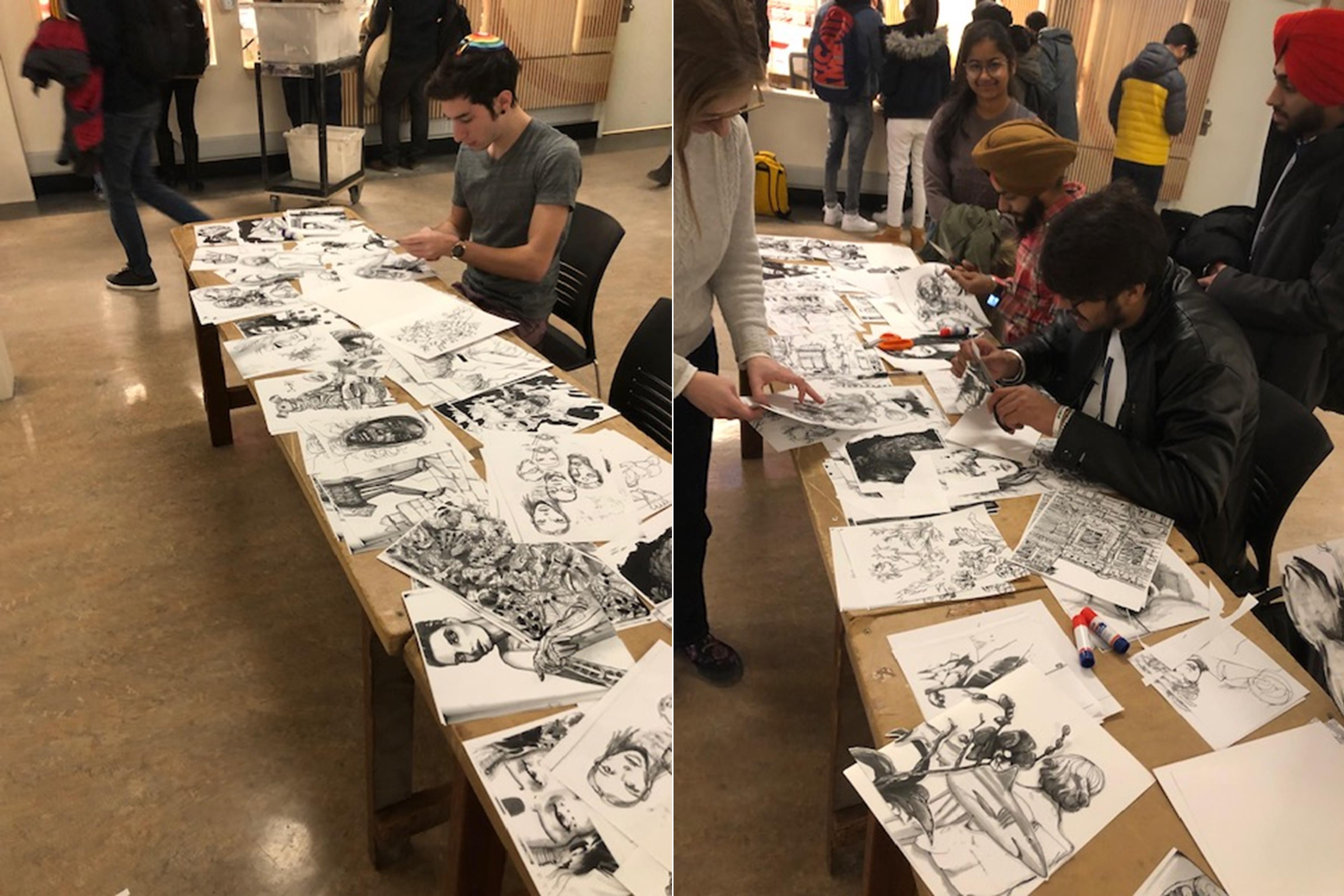 students sitting at a table covered in sheets of paper