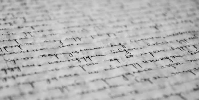 Handwriting on a lined sheet of paper