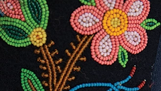 Metis Beading flowers on black bacground