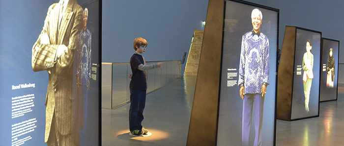 A child views a gallery at the Canadian Museum for Human Rights
