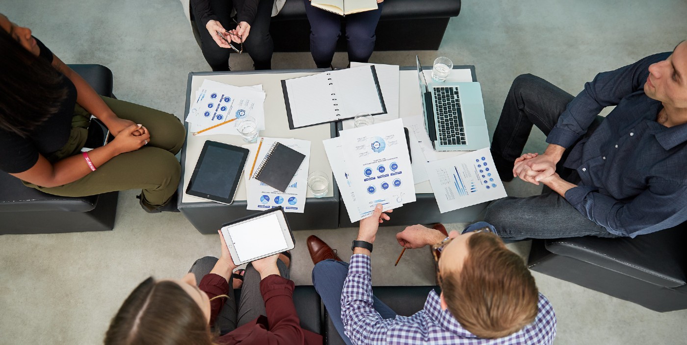 Overhead view of students gathered around a table