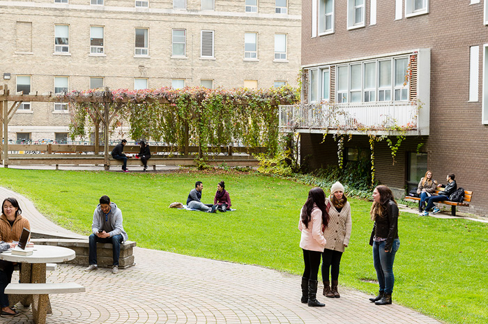Students hanging in the Quad enjoying the great outdoors between classes.