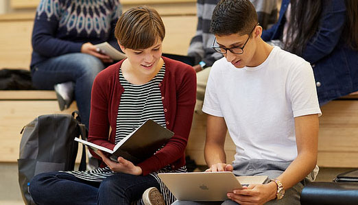 Two students in a classroom