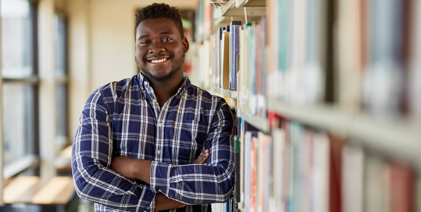 UWinnipeg Student in the Library