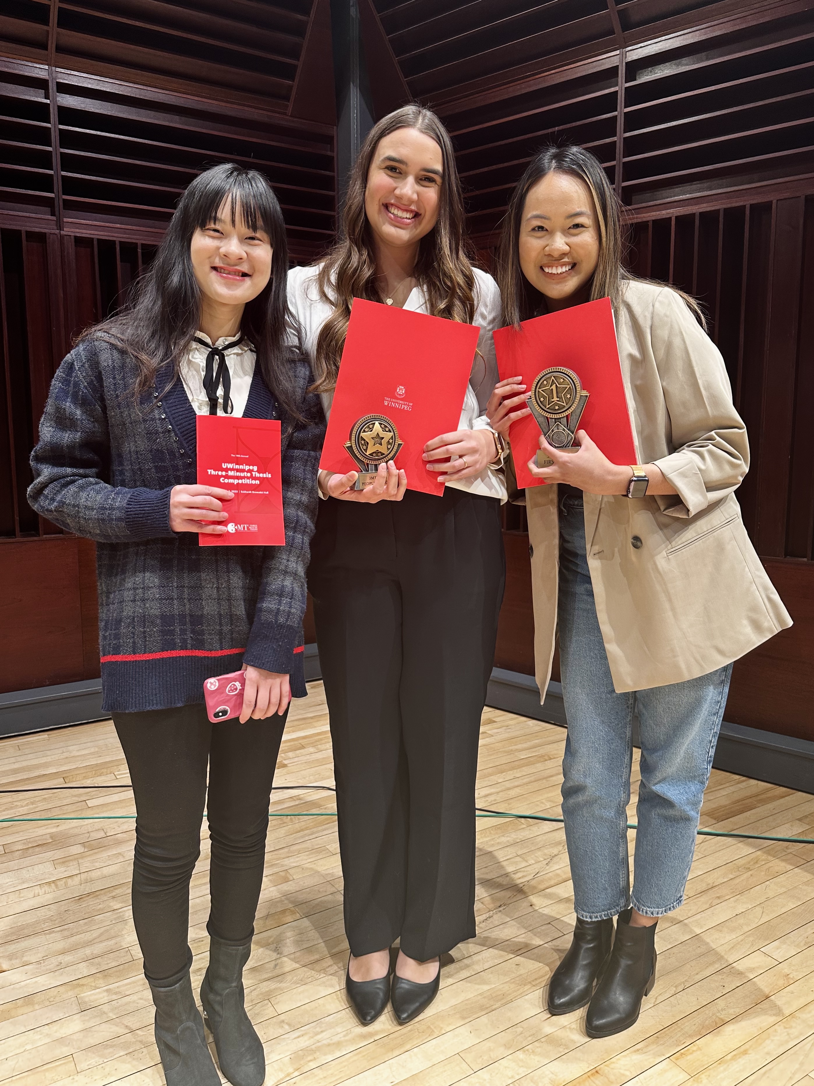 Isabella, Jasmyne, and labmate Michelle Beltran at the 2023 3MT Competition