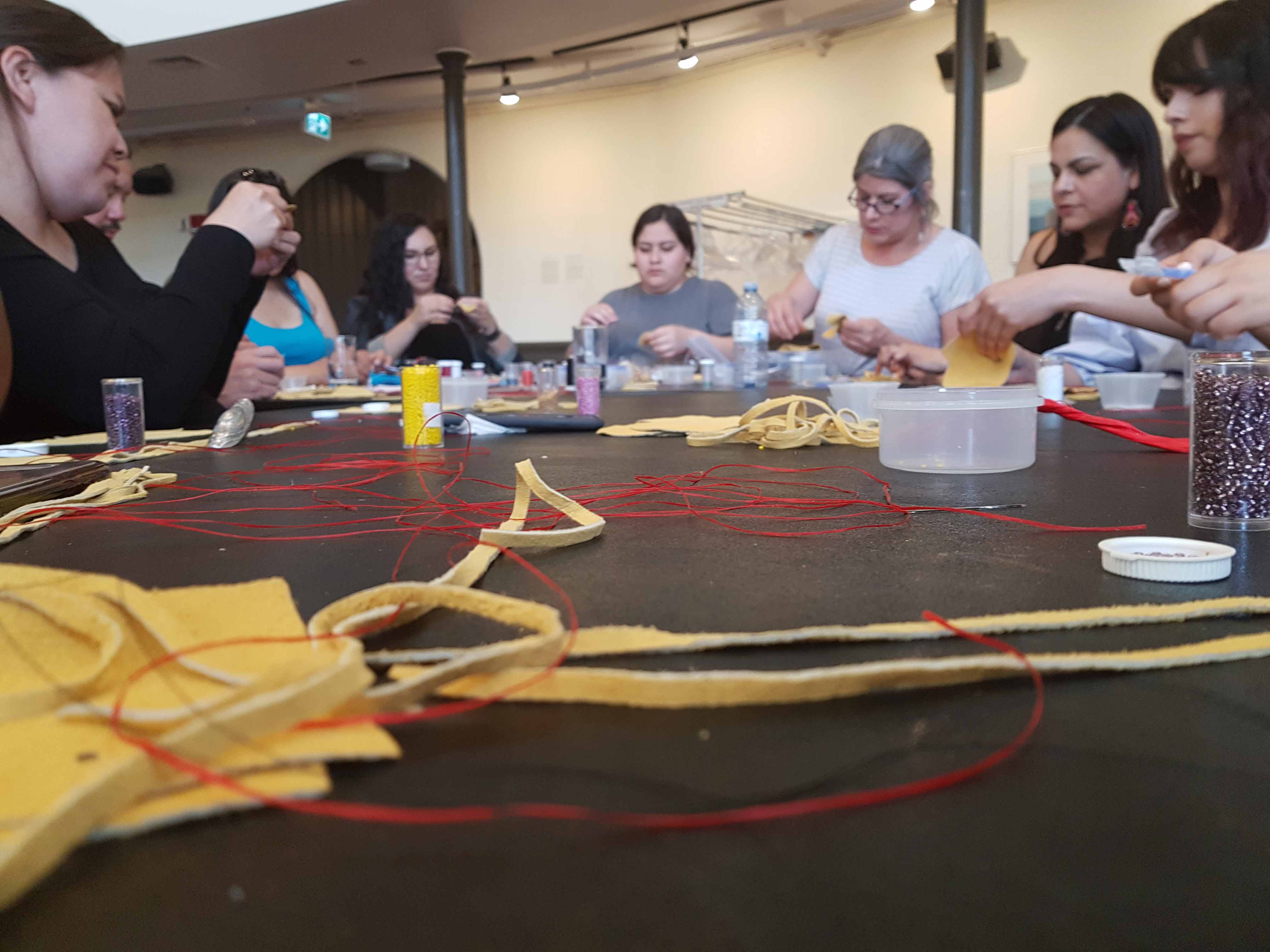 Students making moccasins