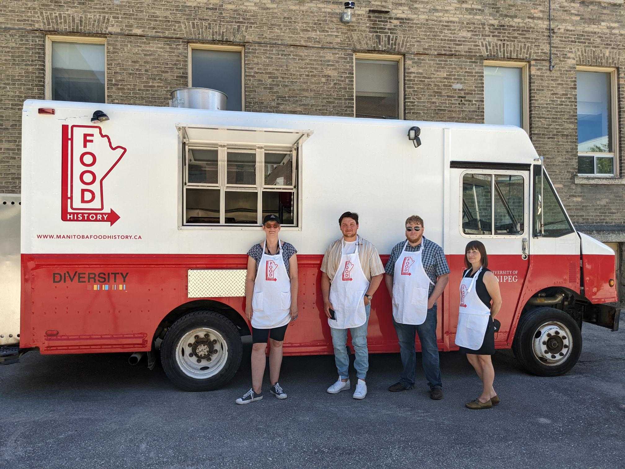 Daniel (second from the left) is pictured in front of the Manitoba Food History Project’s food truck with the other team members: Dr. Janis Thiessen (far left), Kent Davies (second from the right), and Kimberly Moore (far right).
