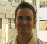 A headshot of Dr. Joshua Hollett.