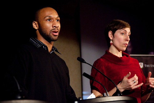 Man at podium with sign language interpreter