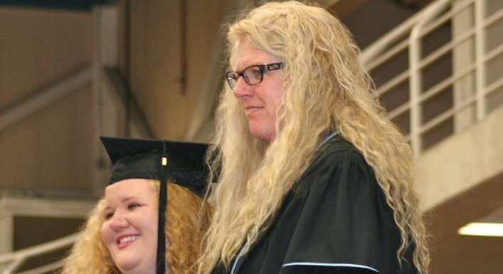 Graduate with Acting Dean, Dr. Jan Stewart