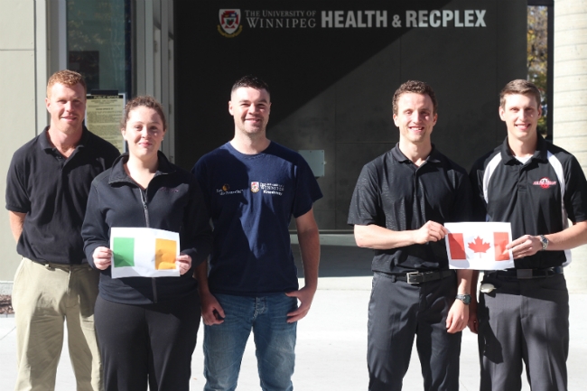 3 Irish Students and 2 Canadian students holding their country's flag