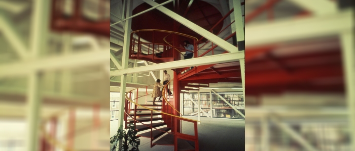 Students ascend the library staircase