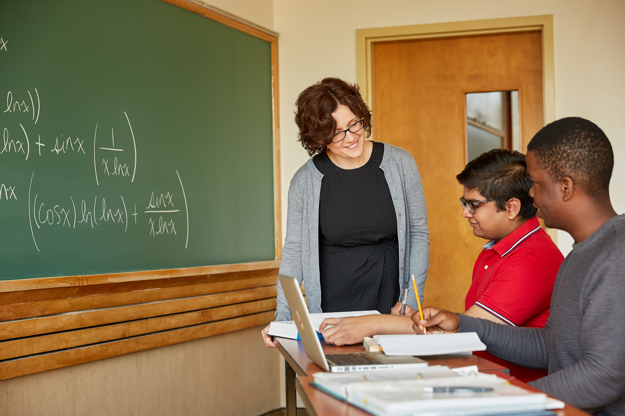 Dr. Anna Stokke works with Math students.