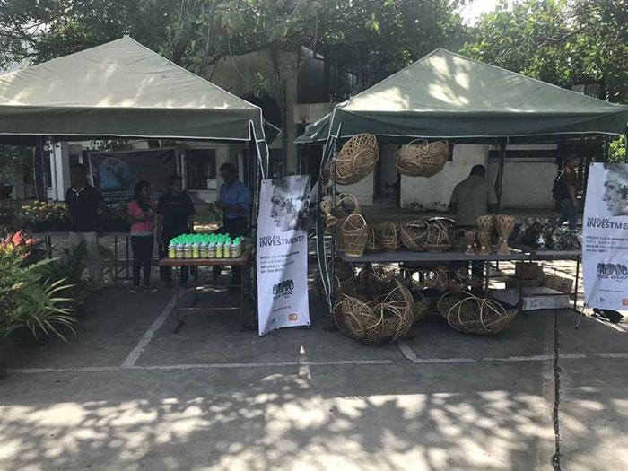 Entrepreneurs setting up their booths at the Saturday market