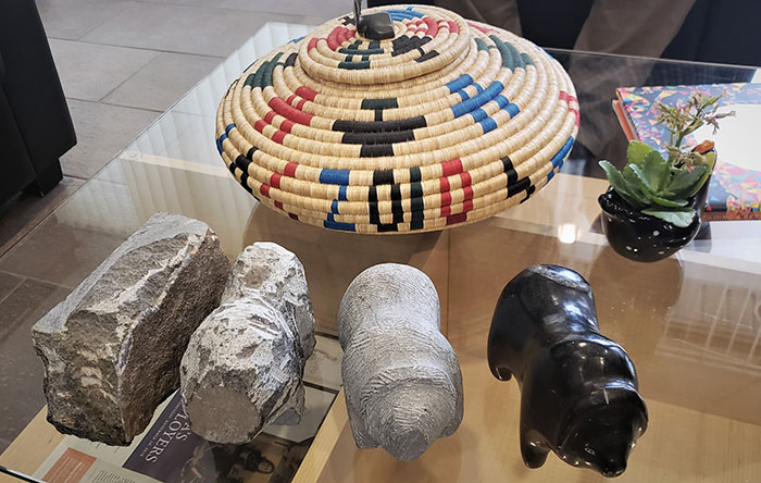 Woven basket and stages of carving