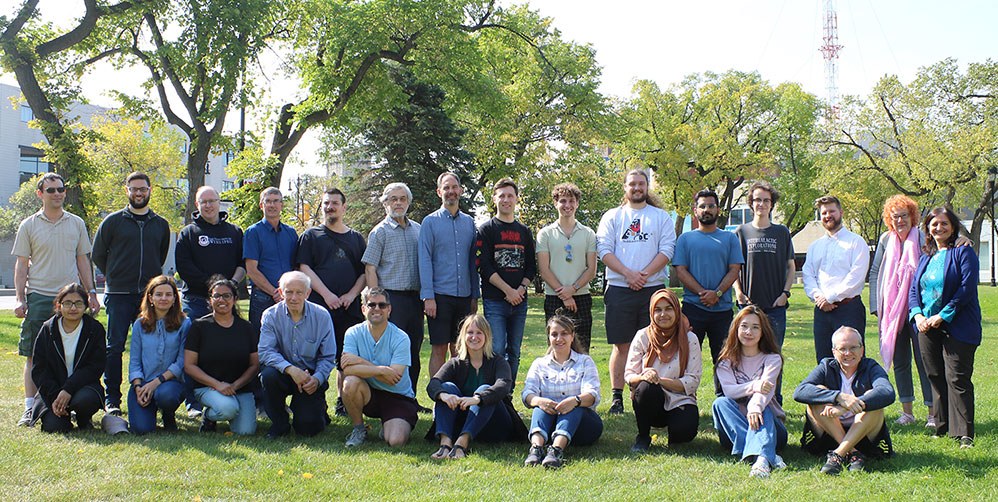 Physics Faculty, Staff, and Students on the front lawn of UWinnipeg