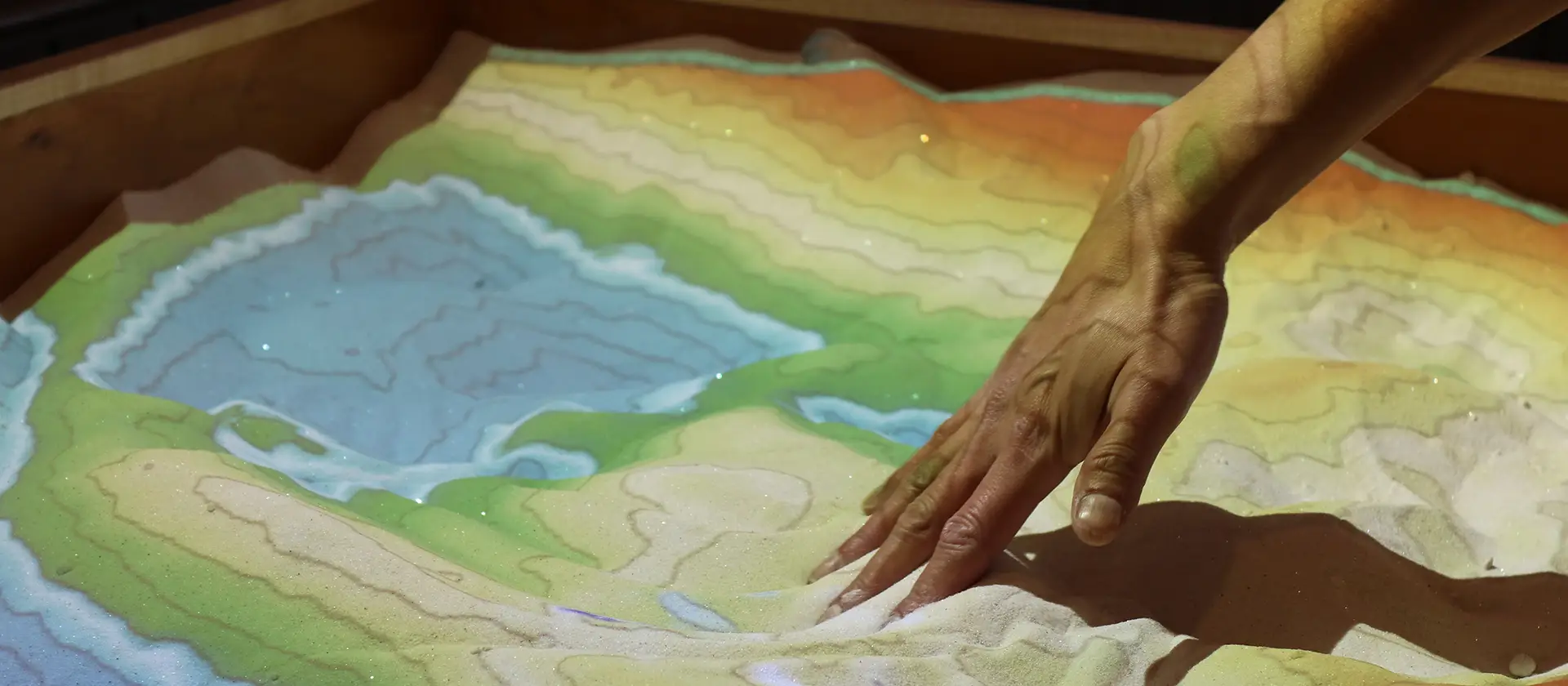 Hand in augmented reality sandbox 
