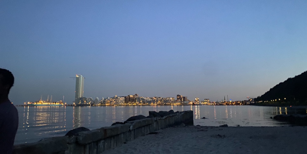 Aarhus, Denmark skyline in the evening from across the water