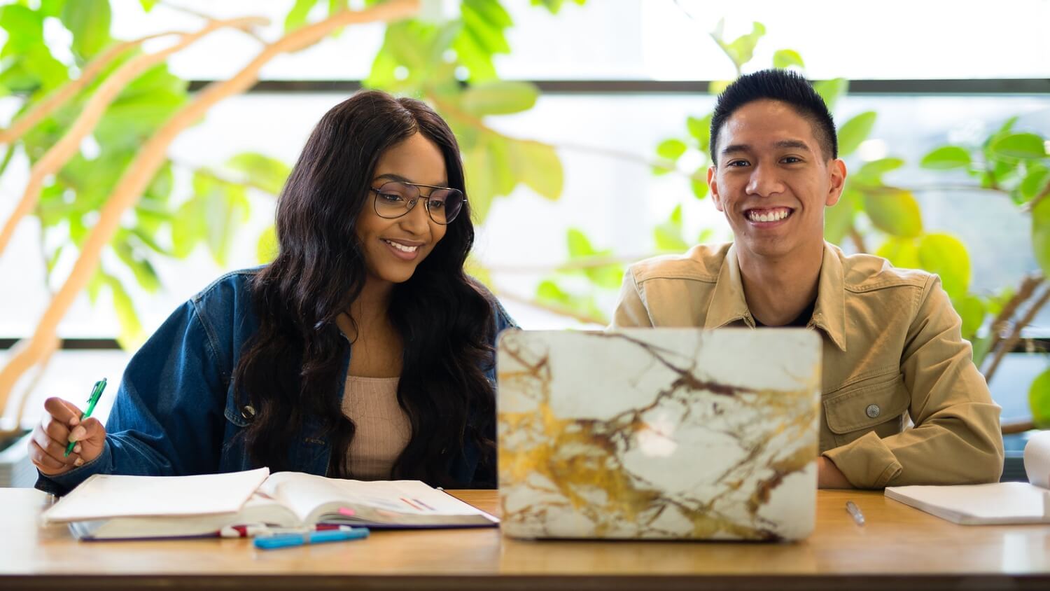Students studying on a laptop