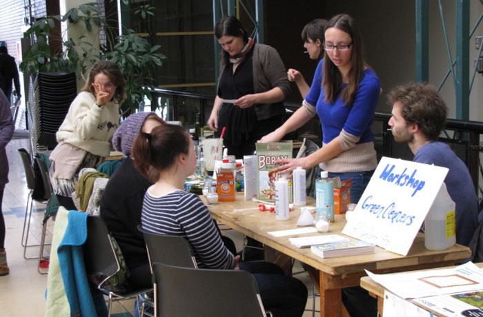 People sitting at workshop table