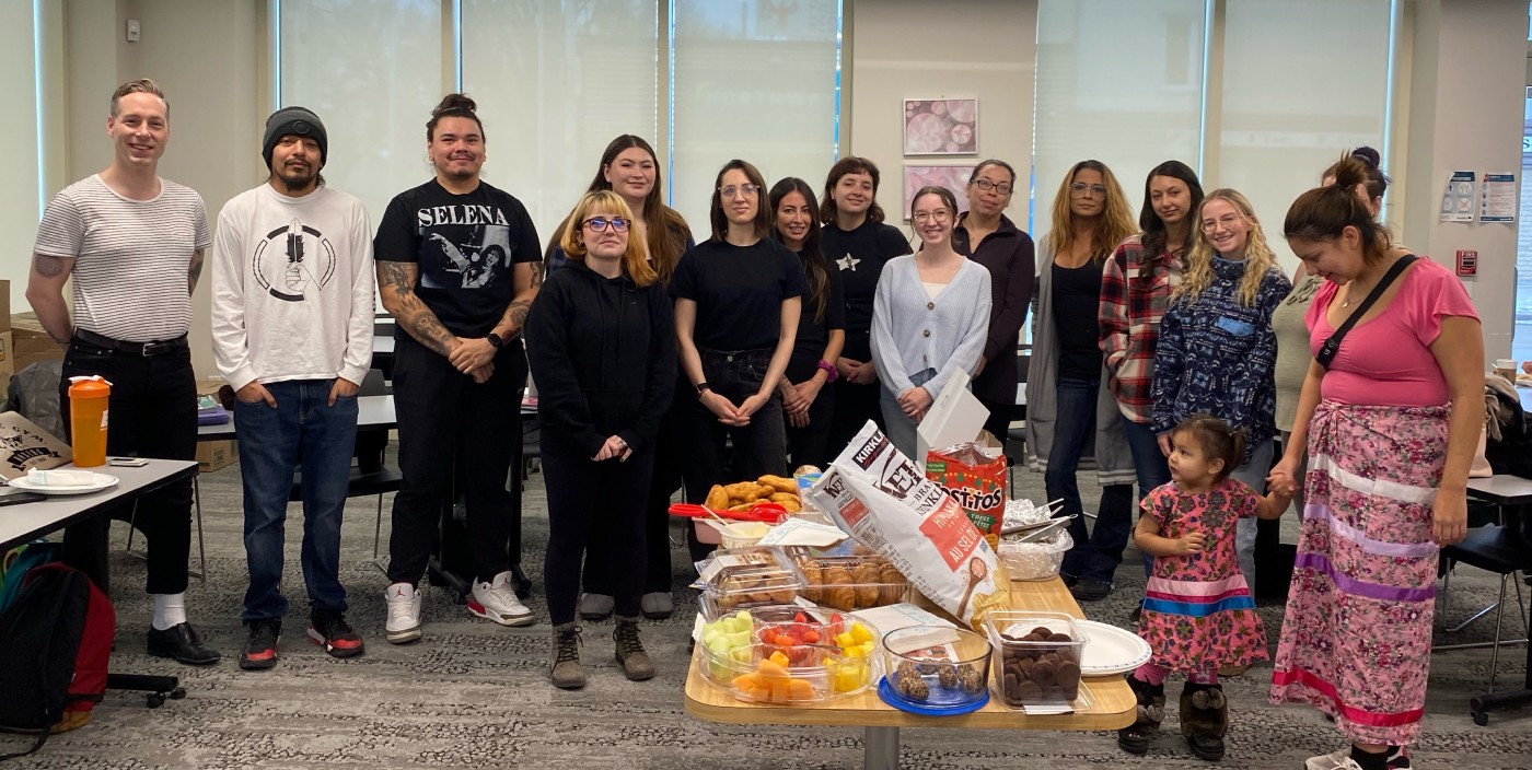 Several students standing together as part of UIC's Community Advocacy Class