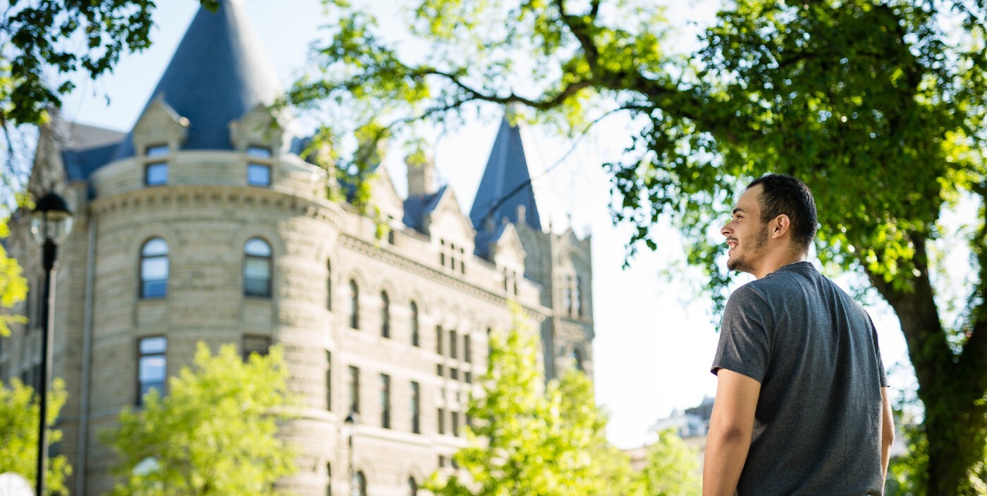 Person looking at the campus outside Wesley Hall