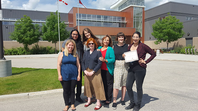 Judith Harris with students outside of Stony Mountain