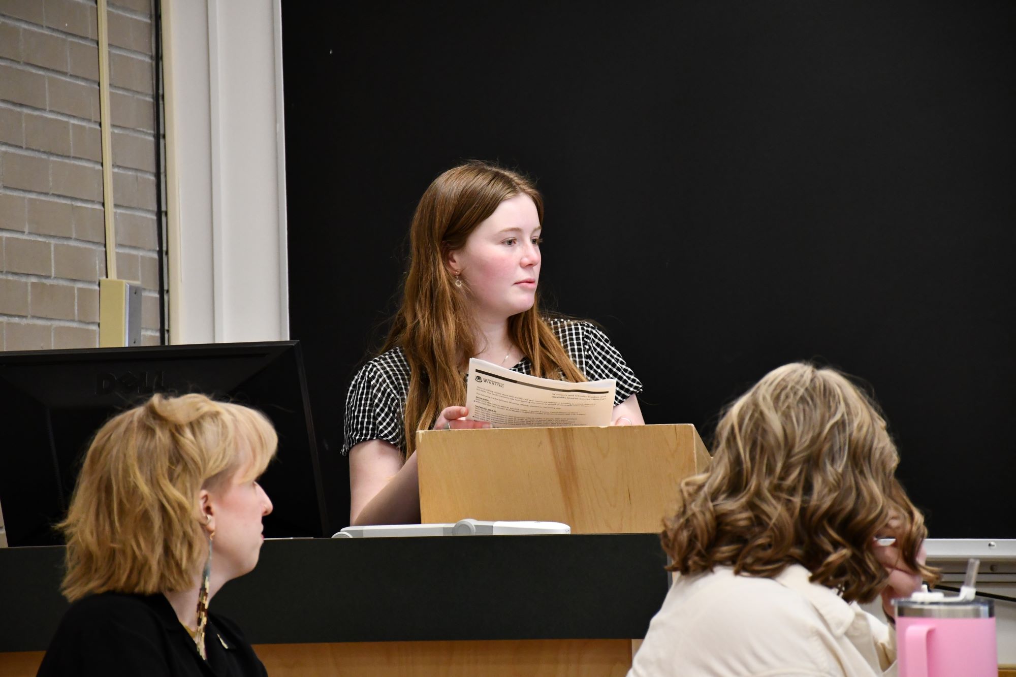 Katie presenting during the WGS Practicum panel
