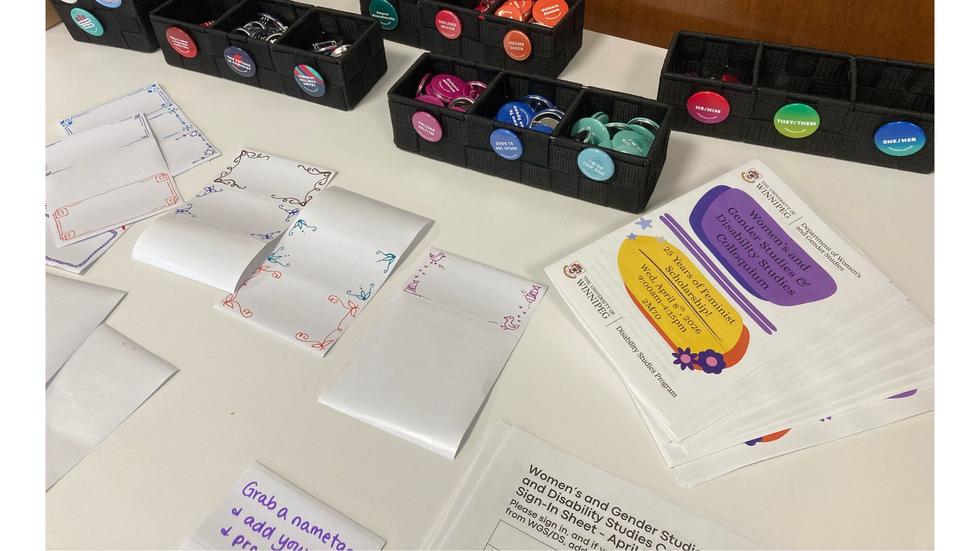 Colloquium program, nametags, and buttons